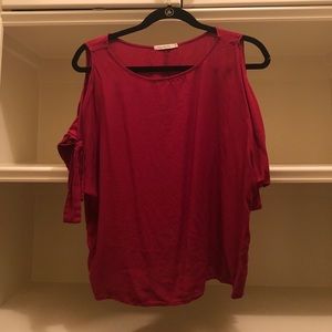 red top with tied sleeves